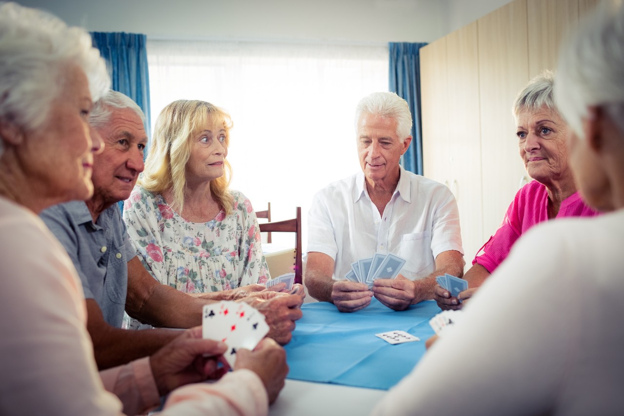 elderly-playing-cards elderly playing cards at table