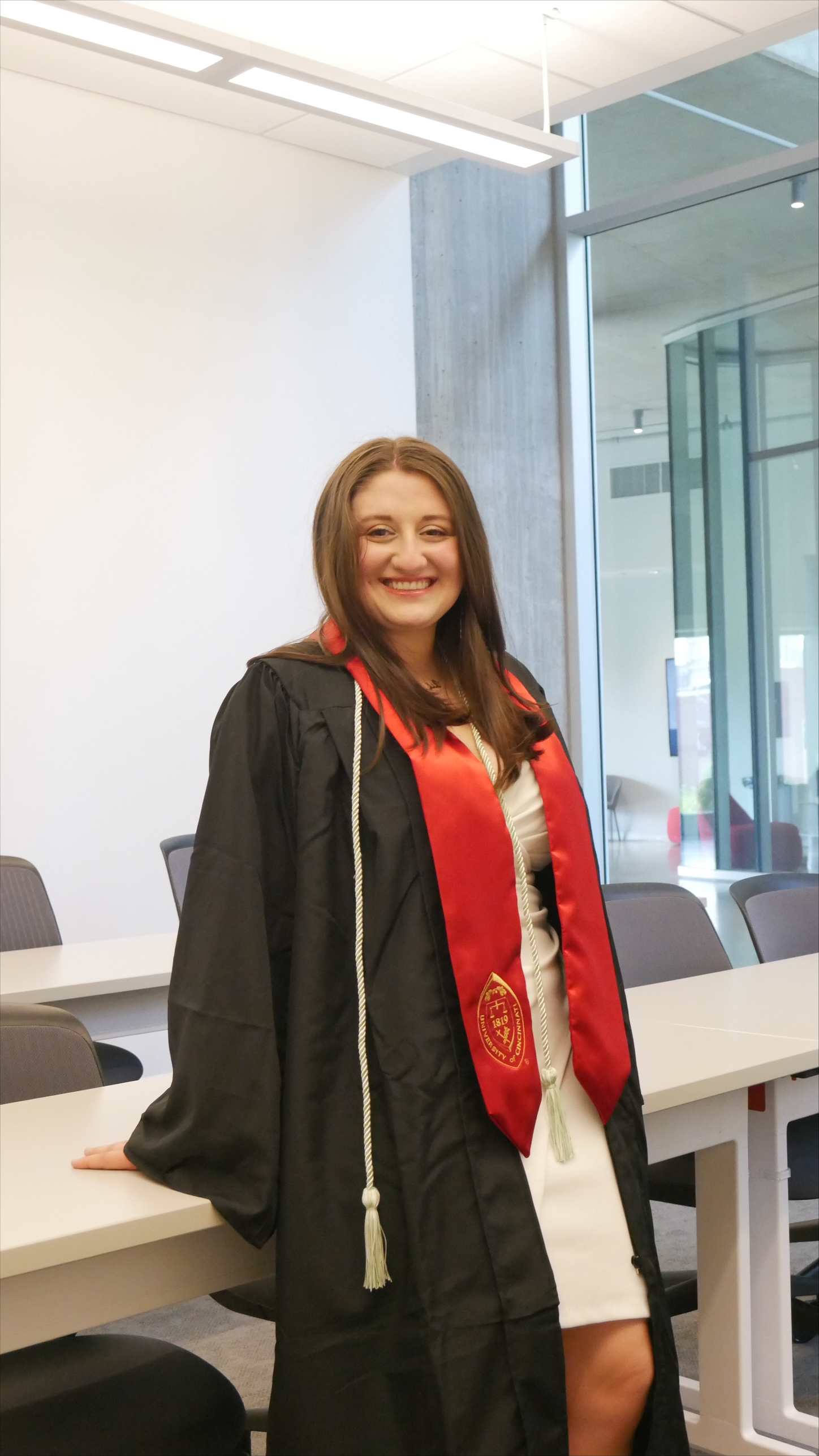 Hend in graduation attire